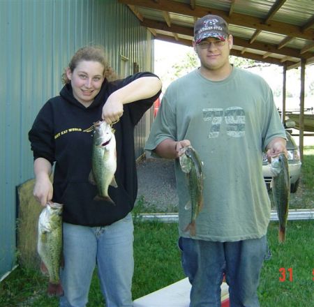 Katie and Pat fishing with Grandpa Bill