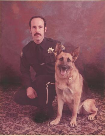 San Jose PD canine officer with Aussie