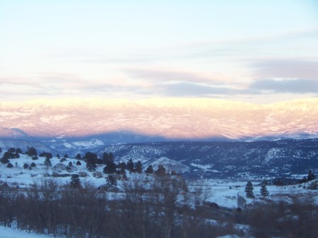 Sun setting over mountains in Colorado