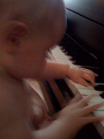 Alden taking piano lessons from Grandma!