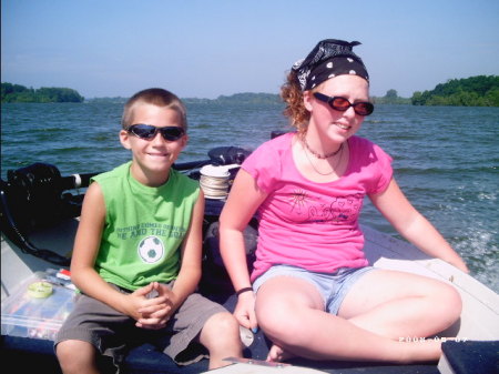 KIDS ENJOYING A DAY ON THE BOAT