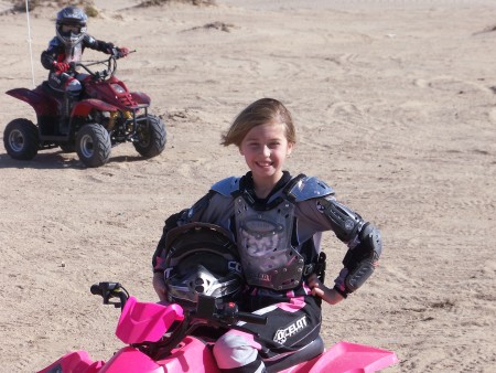 Haley loves to ride her quad