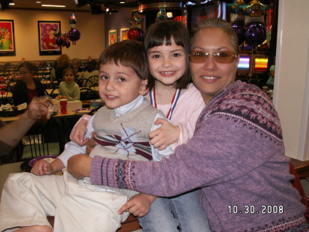 Two of my grandchildren and me