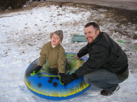 Jonathan and Oliver sledding