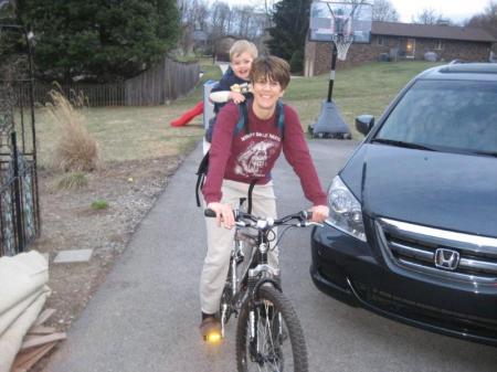 Spencer and I riding the bike.