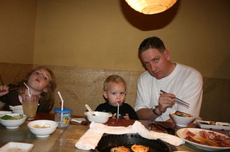 Michael and the kids at dinner