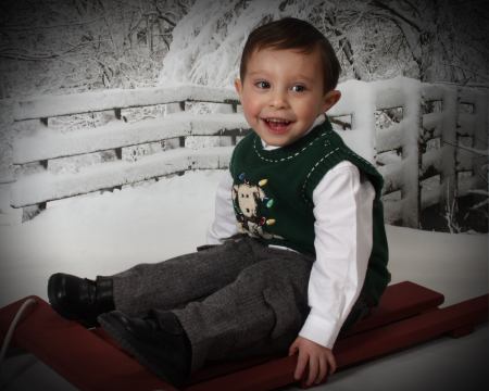 Noah with fake snow, the only kind he knows.