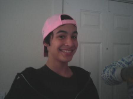 Mike wearing my pink hat.