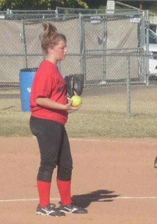 Caitlyn playing in softball tournament