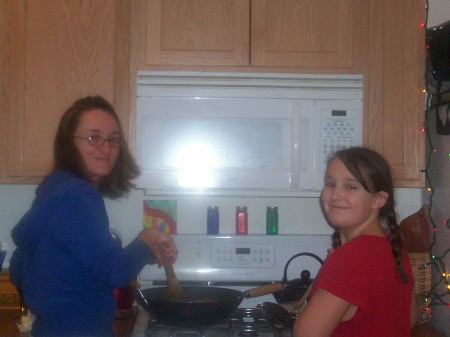 Girls turn at cooking