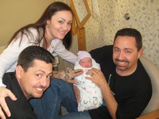 me my bro my sis and my son j.j. at 5 mins old