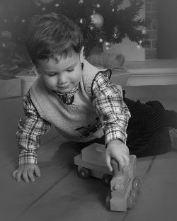 bw nicholas playing with a train