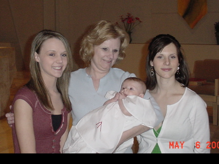 Me and two of my daughters and new grandbaby