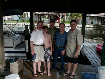 Doug with son and brothers