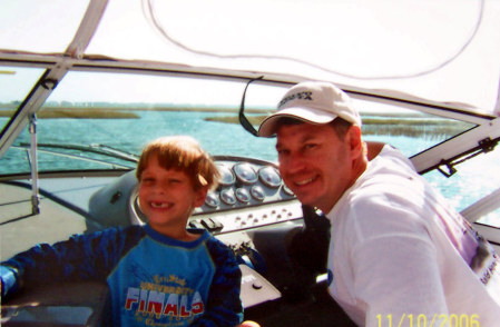 Larry and Taylor on the boat