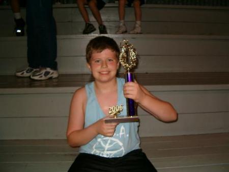 Nicholas with his basketball trophy.