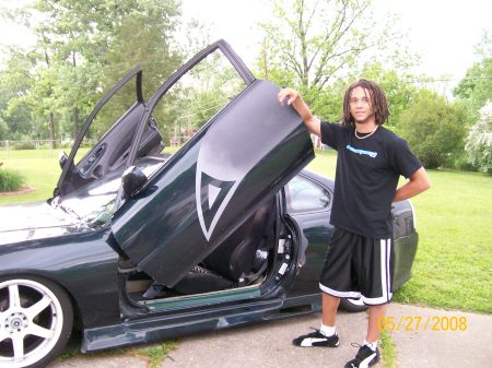 (Son) Aaron with his car.