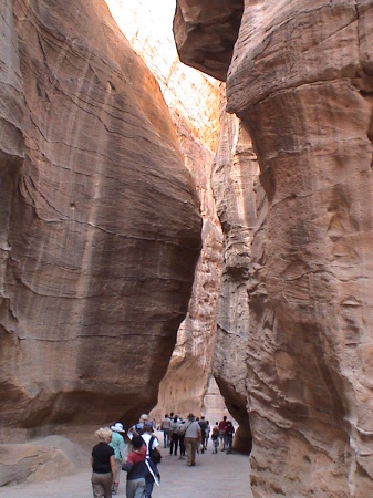 Walking through the walled passage into Petra