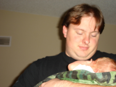 Drew holding the baby