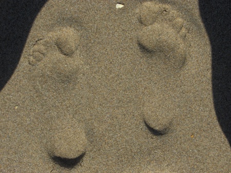 Foot Prints in The sand by Carrie