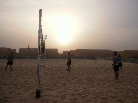 playing volley ball in the desert.