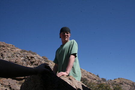 Andrew hiking the bolders at the Davis Mtns.