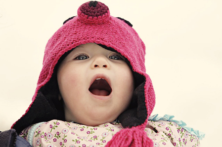 Celia in her piggy hat