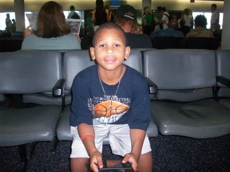 My son chillin' in airport
