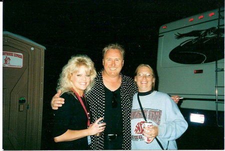 "me, Mike Reno w/Loverboy & my friend Julie"