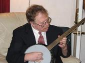 Husband Tom Picking the old Banjo