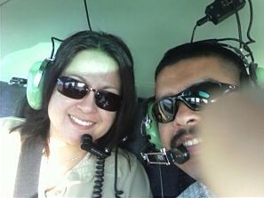 husband & i in a helicopter ride.
