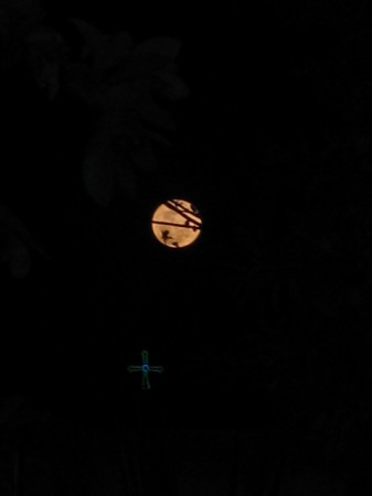 Full moon over church