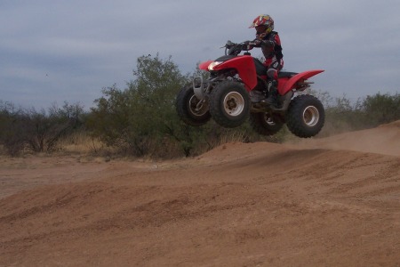 Son Learning to jump