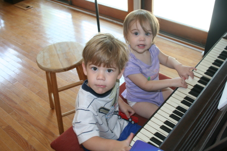 James & Sophia playing piano