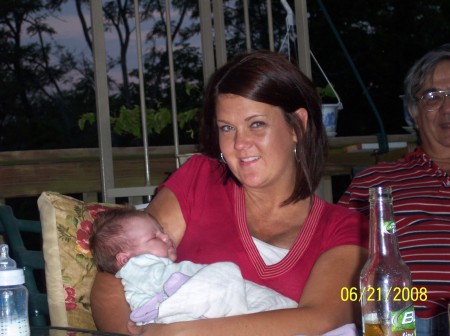 Chris's wife Debbie holding daughter Jayden.