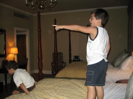 Davin and David playing in the hotel room