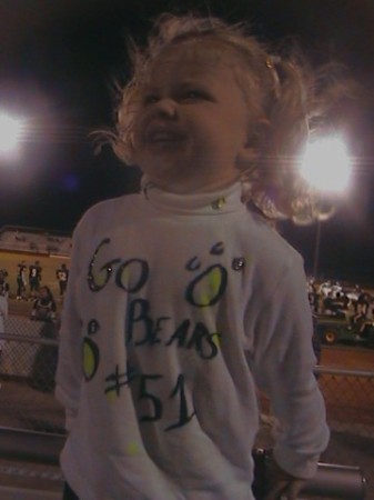 grand baby at my son's football game