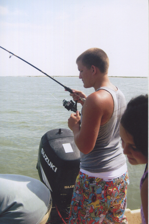 Cameron fishing on vacation