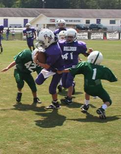 Grandson Keith playing football