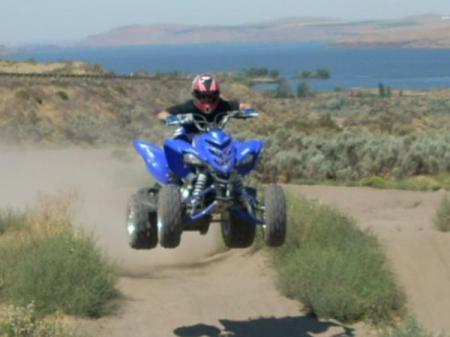My son on his four wheeler out in Oregon