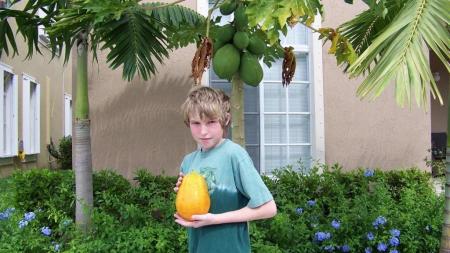 Zakary and our first papaya