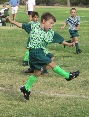 Reed playing soccer