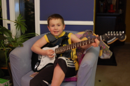 Dario playing guitar