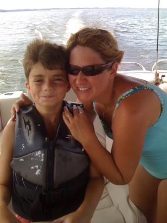 Danny Driving the boat with Donna - age 12