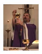 Me - "Pastor Sawyer" - serving at the altar