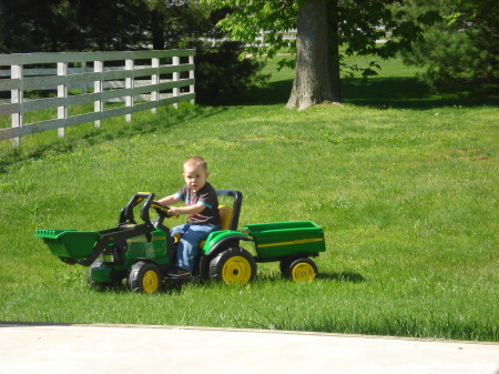 Jaydan taking care of the yard