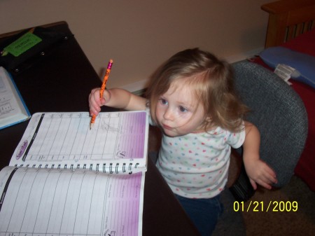 Grace "HELPING" Tyler with his homework!