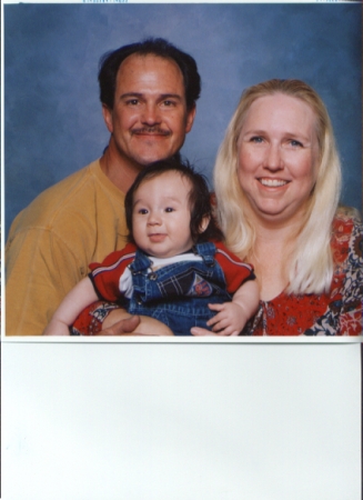 My husband & I and our oldest grandbaby Renie