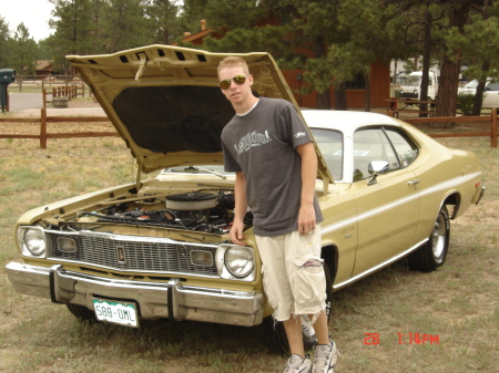 My son Corey with his Muscle car