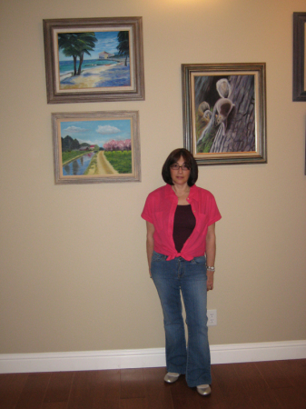 Mindy with original paintings